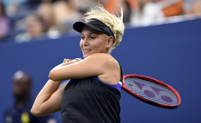 Hampered by knee, '18 champ Osaka loses to Bencic at US Open