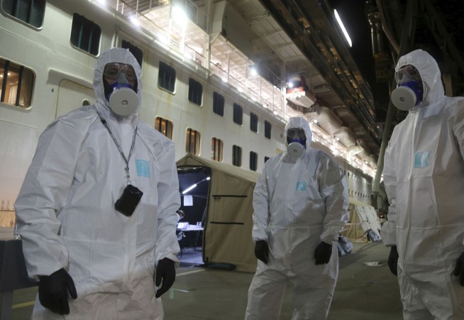 Ship at center of virus outbreak raided by Australian police