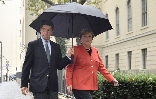 The Latest: Poll: Merkel's conservatives come 1st in Germany