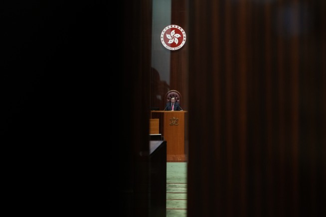 Hong Kong changes electoral law, reduces direct public vote