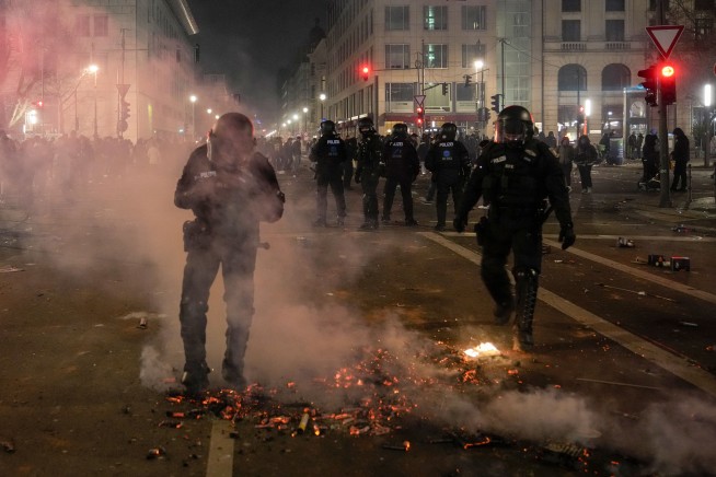 German government condemns New Year's Eve violence after hundreds of arrests