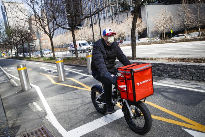 DoorDash to pay NY delivery workers $17 million for using their tips to cover wages