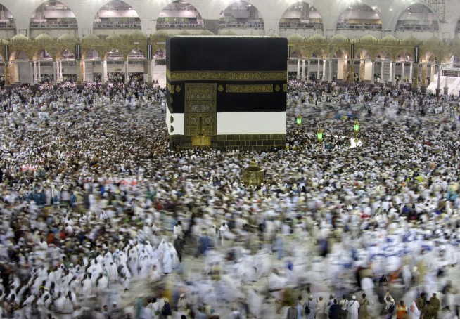 Saudi Arabia halts pilgrimages over virus; Iran cases spike