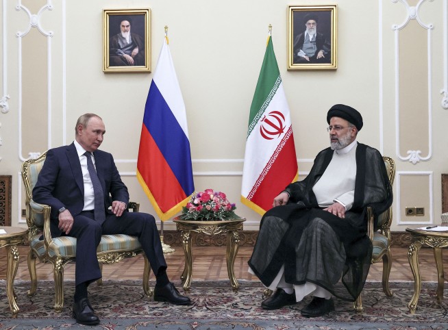 Putin, in Tehran, gets strong support from Iran over Ukraine