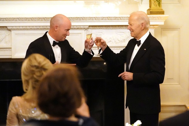 Biden and Utah's governor call for less bitterness and more bipartisanship in the nation's politics