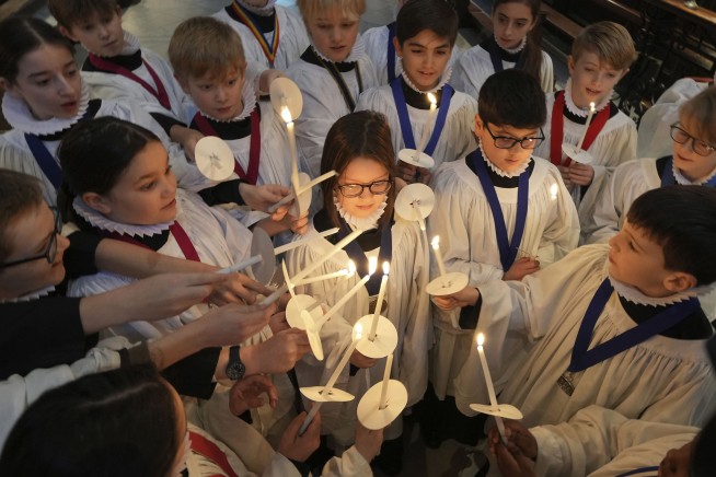 AP PHOTOS: Girls will be part of St. Paul's Cathedral choir on Christmas Day for first time