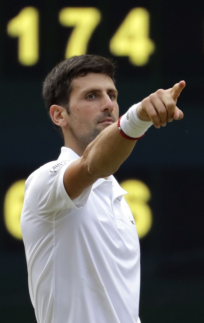 Djokovic edges Federer in 5 sets for 5th Wimbledon trophy