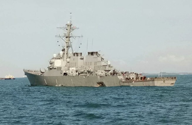 Nations search for 10 missing after US destroyer collision