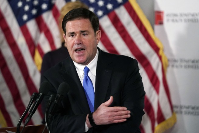 GOP Gov Ducey welcomes Dem Hobbs though no Lake concession