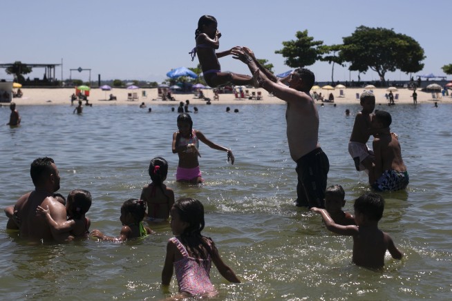 Rio de Janeiro's hottest day in at least a decade sends residents to the beach