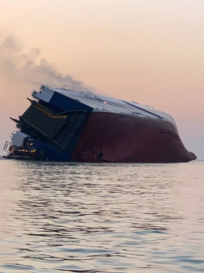 Ship overturns near Georgia port; 4 crew members missing