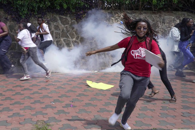 Police in Kenya hurl tear gas at protesters angry about gender-based violence