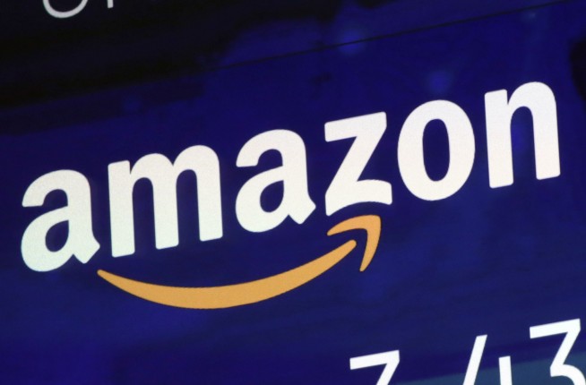 After backlash, Amazon to boost pay for longtime workers