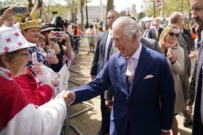King Charles III surprises crowd outside Buckingham Palace