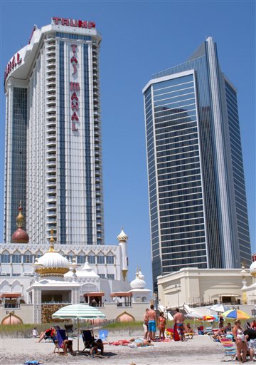 APNewsBreak: Trump sues to get name off casinos