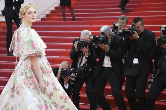 Elle Fanning OK after fainting at Cannes dinner