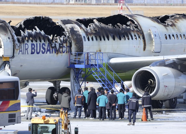 Passenger plane catches fire at South Korean airport. All 176 people on board are evacuated