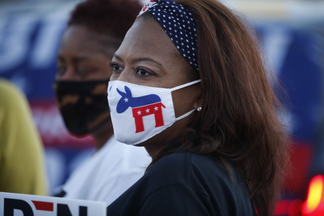 Biden vows end of national 'darkness' in convention finale