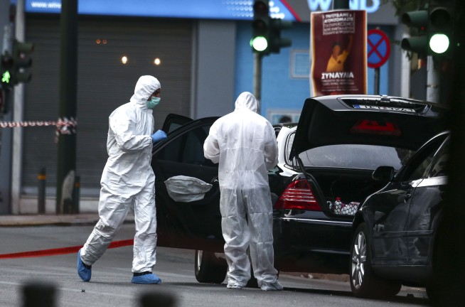 Greek ex-premier Papademos wounded in Athens bomb blast