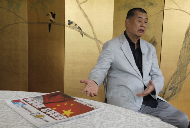 AP Interview: Hong Kong media tycoon says city now 'dead'