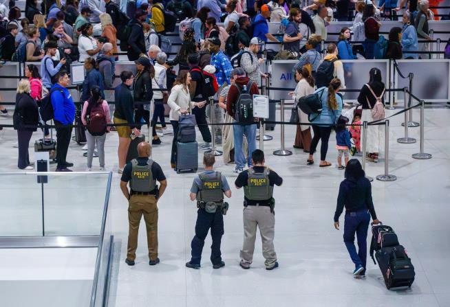 ICE officers aren't trained in airport security. Can they help ease long lines?
