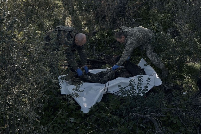 Russia evacuates occupied Ukrainian city, orders martial law