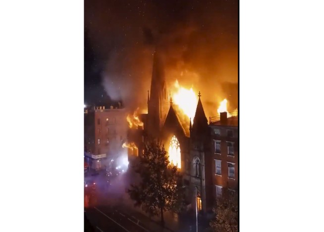 Predawn fire guts old church housing New York's Liberty Bell