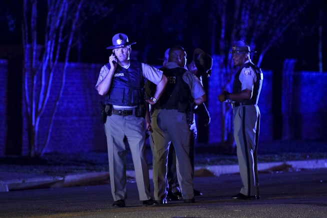 Suspect in shooting of 7 officers is competitive rifleman