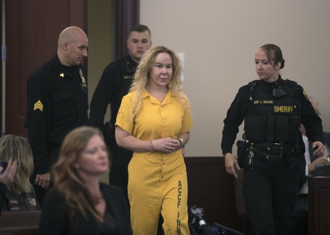 Trial starts for woman charged with killing her twin