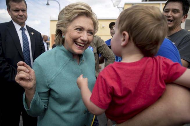 The Latest: Katy Perry gives a roar for Clinton at concert