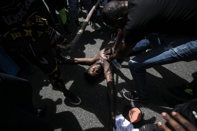 Demonstrators protest killing of Congolese refugee in Brazil