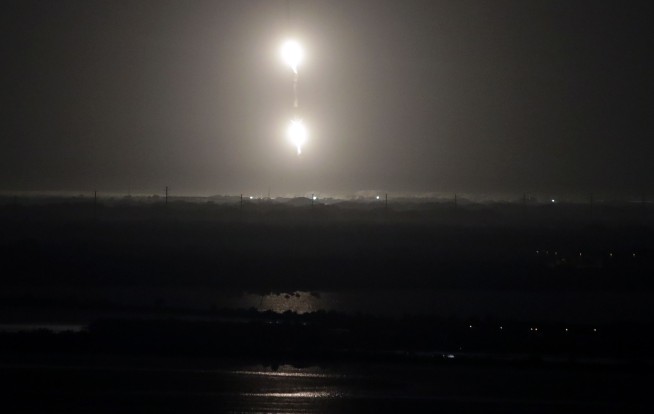 SpaceX launches hefty rocket with 24 satellites