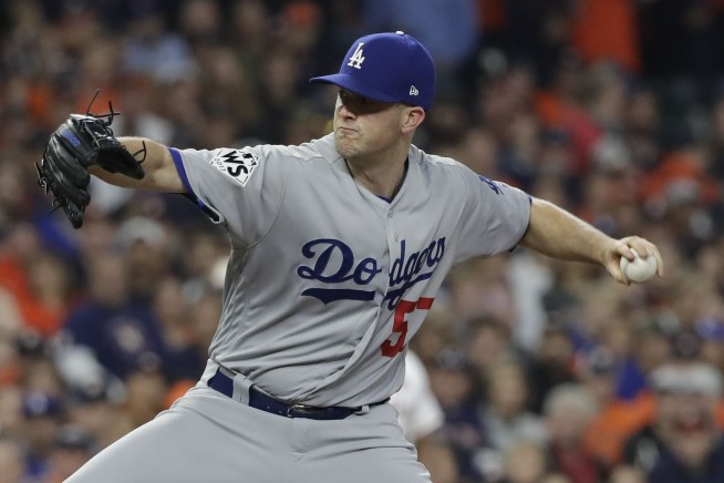 The Latest: Dodgers take Game 4 with big 9th inning