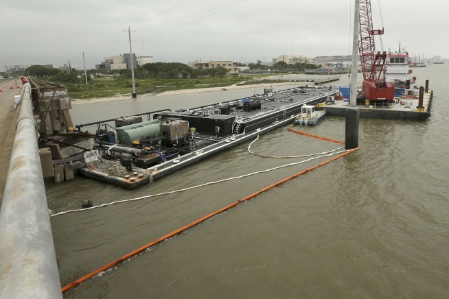 US Coast Guard says Texas barge collision may have spilled up to 2,000 gallons of oil
