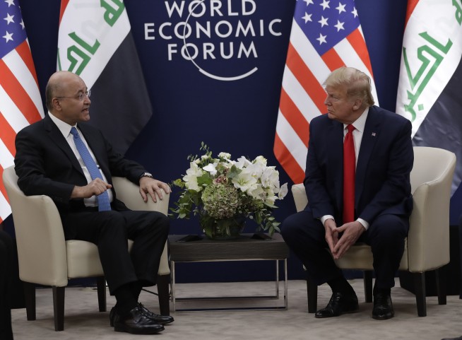 Trump lauds US economy at Davos forum, slams impeachment