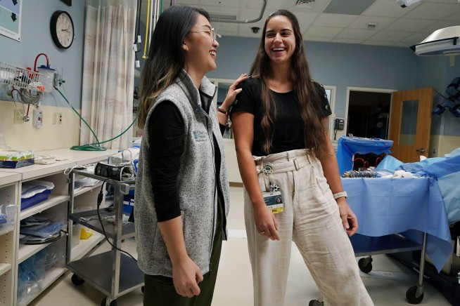 A young nurse suffered cardiac arrest while training on the condition. Fellow nurses saved her life