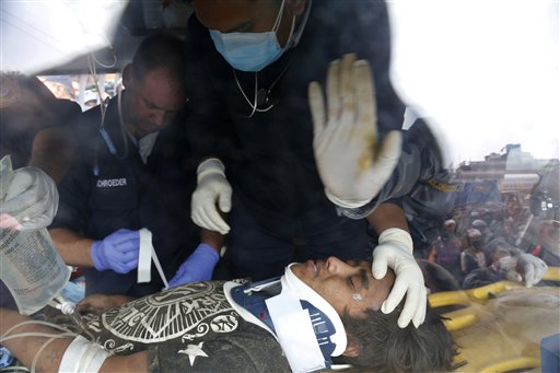 The Latest on Nepal: Woman rescued 5 days after quake