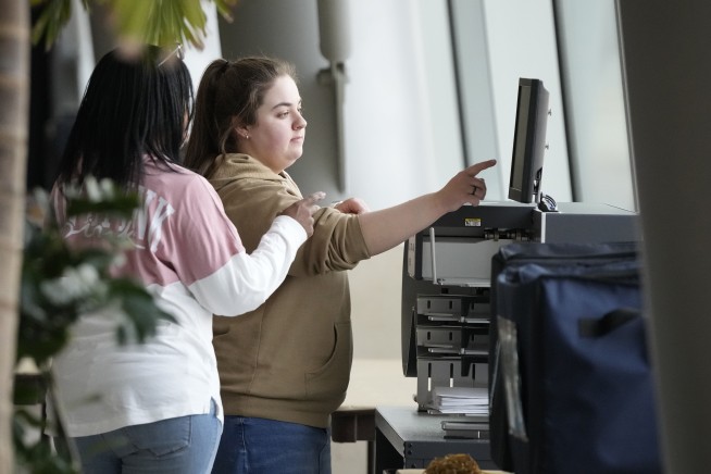 Trump and Biden won Michigan. But 'uncommitted' votes demanded attention