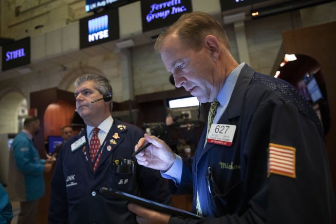 Markets Right Now: Stocks sink then recover after Fed cut