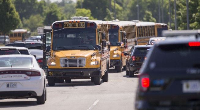 The Latest: Teacher's brother says he was shot 3 times