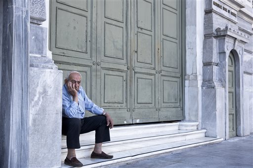 The Latest: Greece's Varoufakis says IMF won't be paid