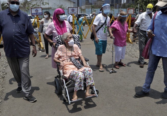 India's COVID-19 human crisis spirals with record new cases