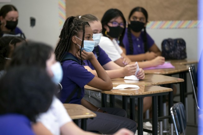 Mask disputes, outbreaks make for rocky start of school year