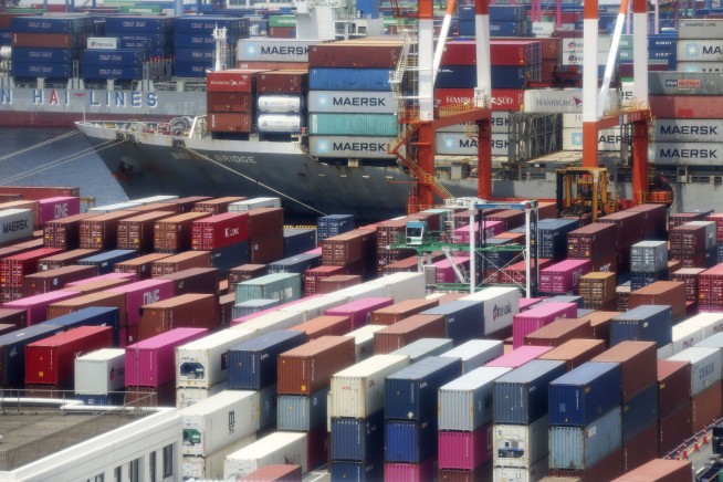 Japan's economy shrinks at record rate, slammed by pandemic