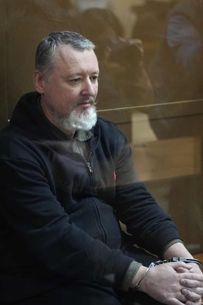 Russian courts jail a Putin critic and a woman convicted of a blast that killed a pro-war blogger