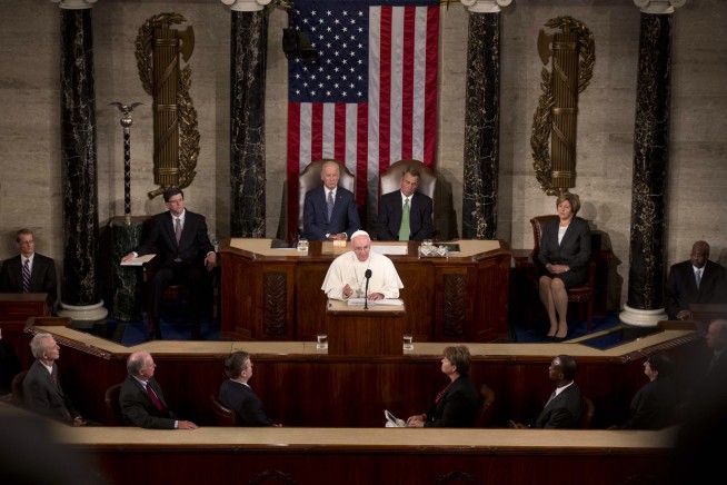 The Latest: Pope draws cheers from tens of thousands