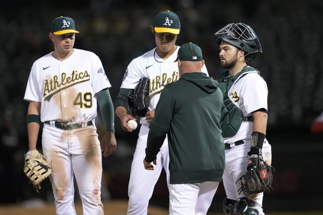 A's met by fans in Oakland with chants of `Sell the team!'