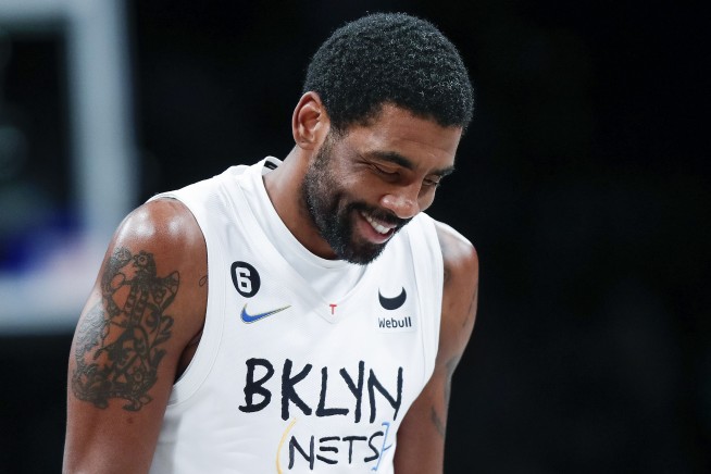 Irving rejoins Nets, seeks to keep focus on basketball