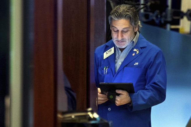 Stocks sway lower and crude oil slides to $100 per barrel