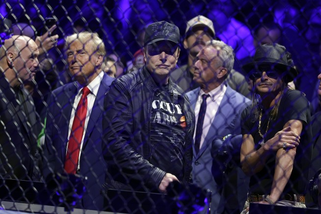Trump attends UFC championship fight in New York, taking a break from Cabinet picks
